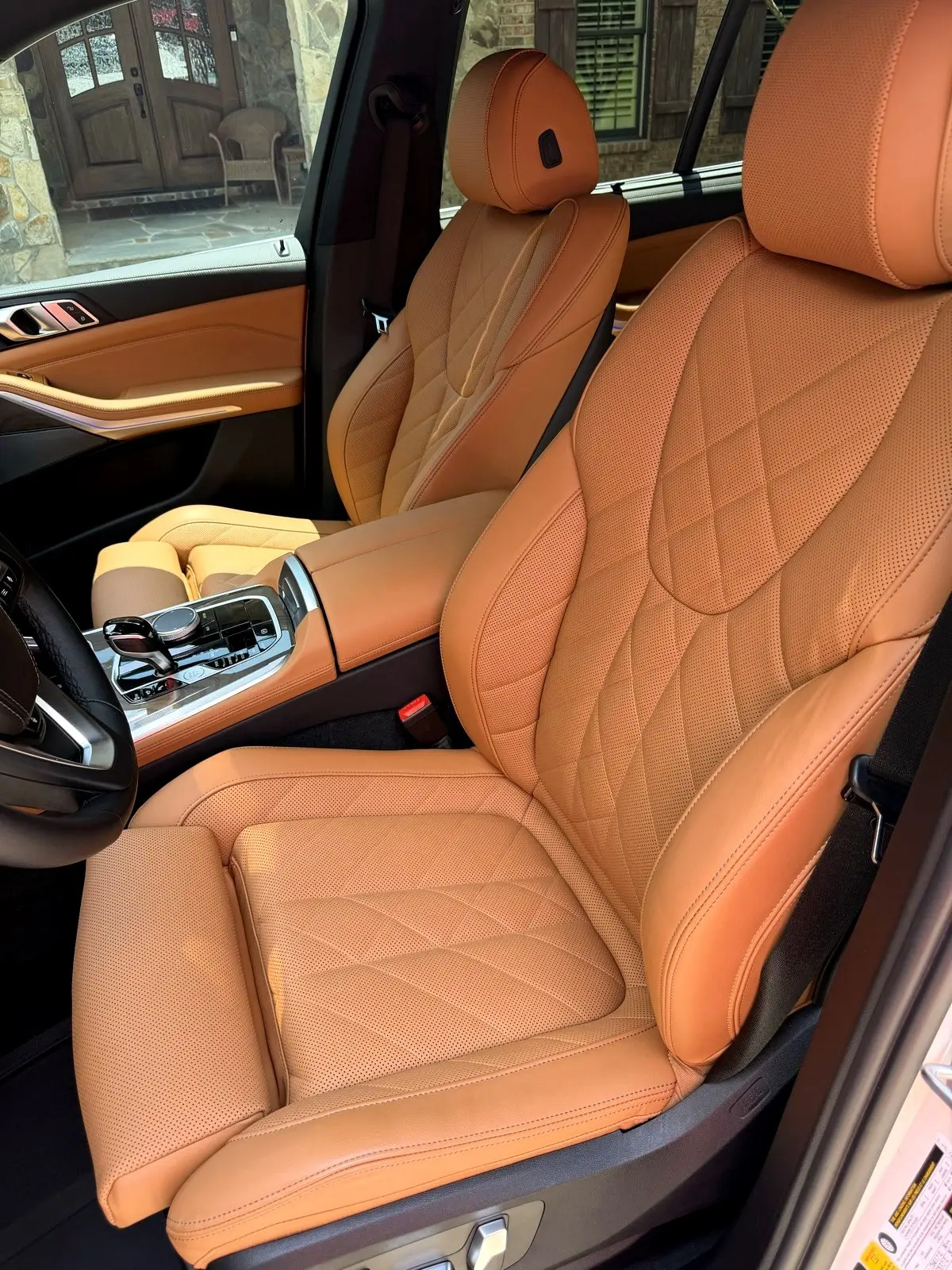 Cognac leather front seats after an interior detail